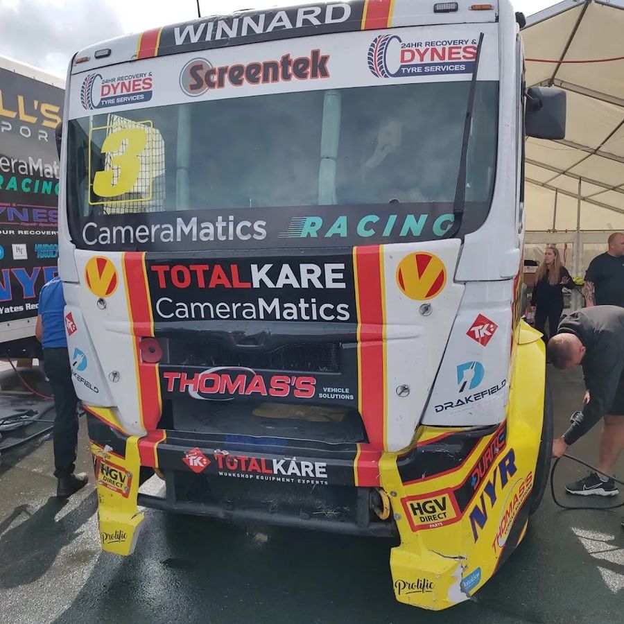 Front of race truck number 3 with VAPTA logos in the paddock