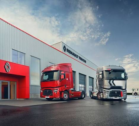 Alex Aiken & Son Renault Trucks dealership with red and silver Renault T tractor units